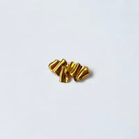 The Mokanda Golden Ribbon Brooch