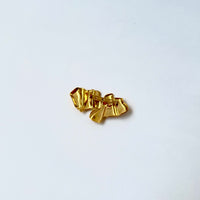 The Mokanda Golden Ribbon Brooch