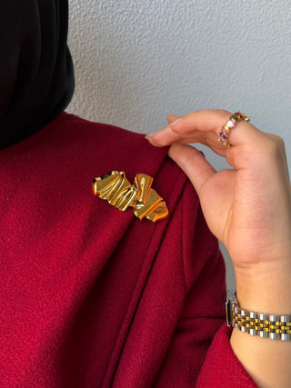 The Mokanda Golden Ribbon Brooch